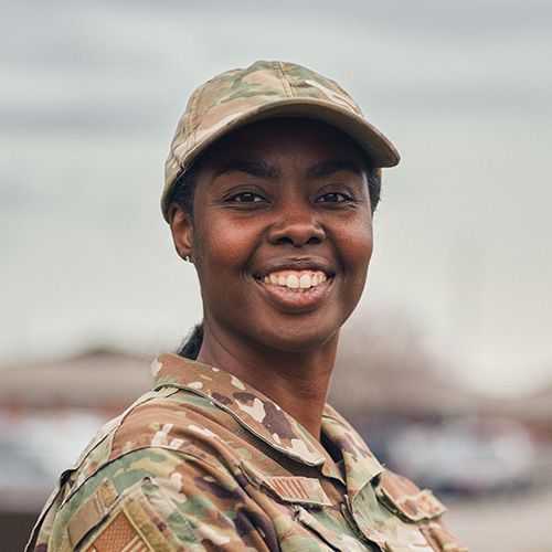 Woman in U.S. Air Force Reserve uniform smiling and facing forward